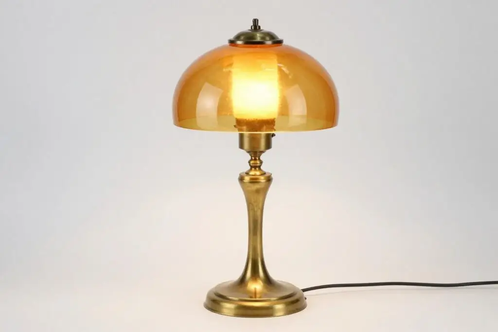 vintage brass and glass table lamp with sculptural design